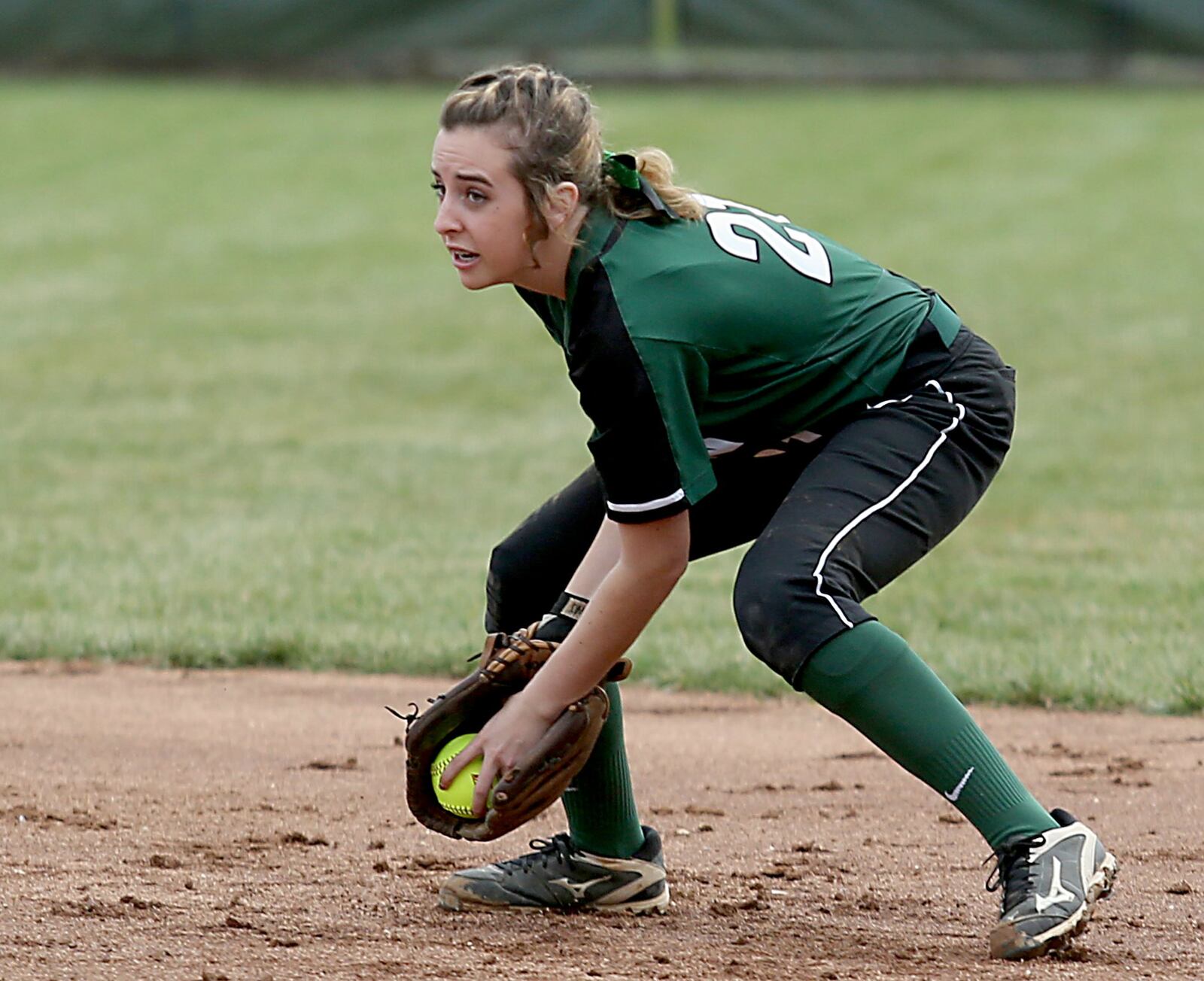 Badin center fielder Gracie McHugh makes a play with the ball during Monday’s game against Wilmington at Mueller Stadium in Hamilton. CONTRIBUTED PHOTO BY E.L. HUBBARD