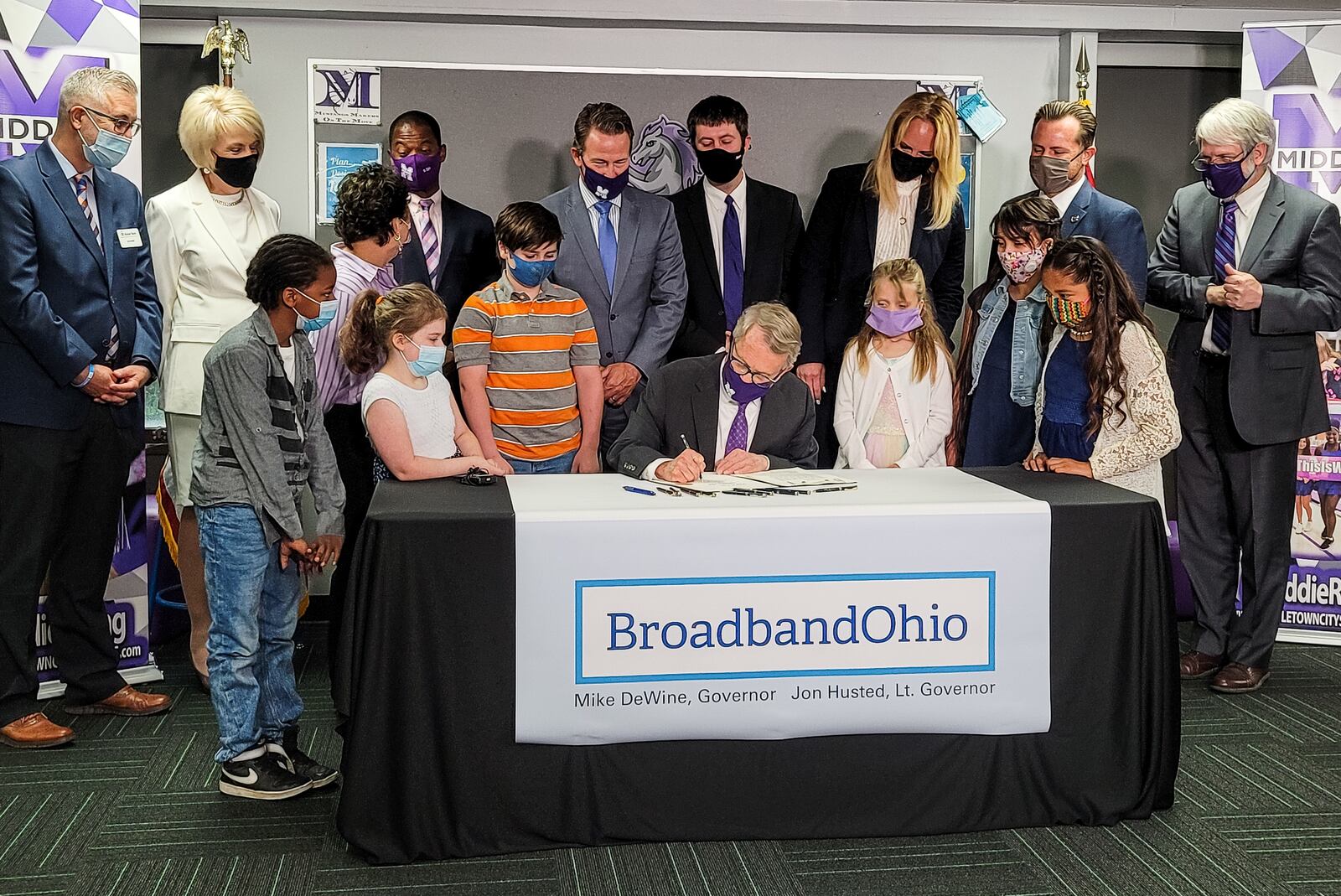 Ohio Governor Mike Dewine signs House Bill 2 for the Ohio Residential Broadband Expansion Grant Program during a press conference Monday, May 17, 2021 at Amanda Elementary School in Middletown. The program awards grants to providers to fund the construction of broadband projects in unserved and underserved areas in the state of Ohio. NICK GRAHAM / STAFF