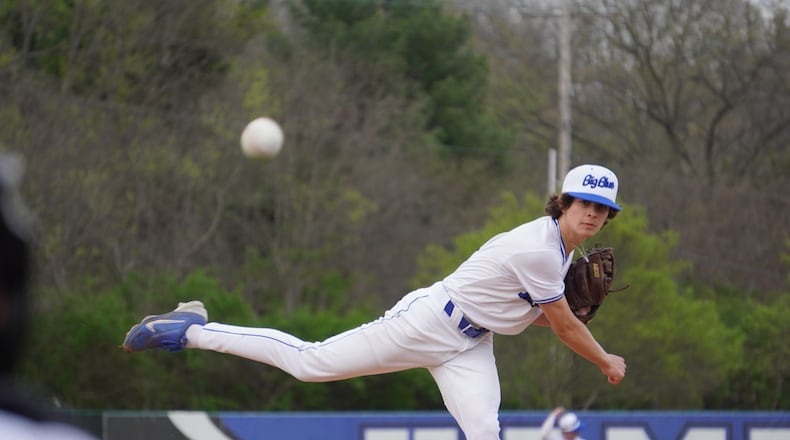Hamilton's Jacob Eads sends a warmup pitch to the plate during his game against Talawanda on Saturday night at Stang Field.