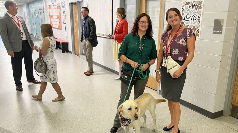 Central Elementary Principal Karrie Gallo, pictured with school therapy dog, said she recently learned she will be one of only 15 educators in Ohio to earn a travel grant to learn culture and history in Ghana to better help her African-native students transition into an American school. (Provided)