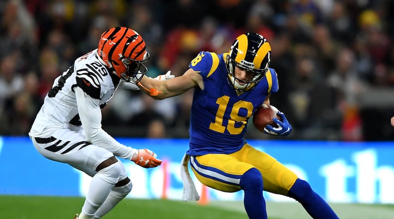 LONDON, ENGLAND - OCTOBER 27: Jared Goff of Los Angeles Rams hands off Tony McRae of Cincinnati Bengals during the NFL game between Cincinnati Bengals and Los Angeles Rams at Wembley Stadium on October 27, 2019 in London, England. (Photo by Alex Davidson/Getty Images)