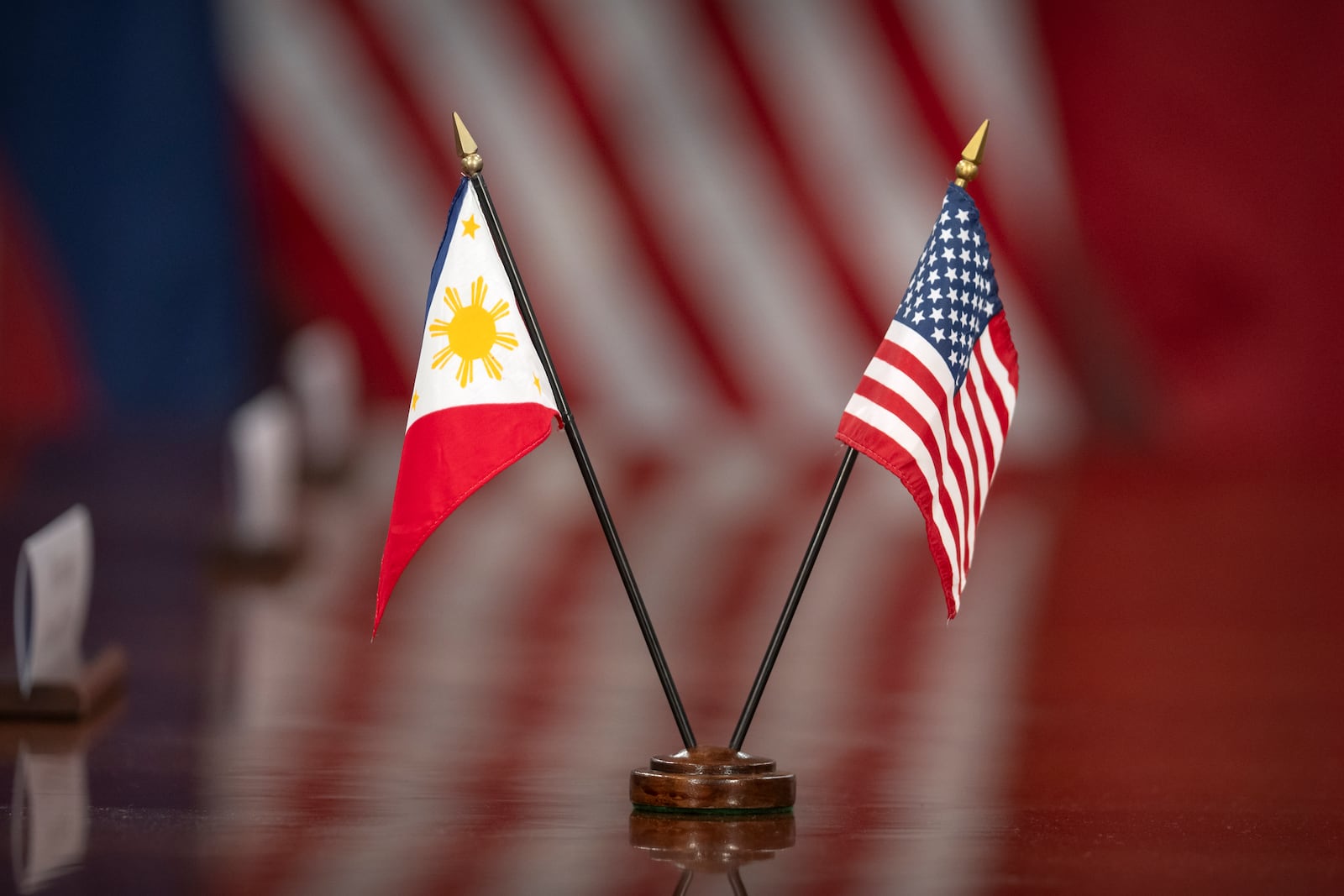 Philippine and U.S. flags are displayed during a meeting between Secretary of Defense Pete Hegseth and Philippine President Ferdinand Marcos Jr. at the Pentagon, Monday, July 21, 2025, in Washington. (AP Photo/Mark Schiefelbein)