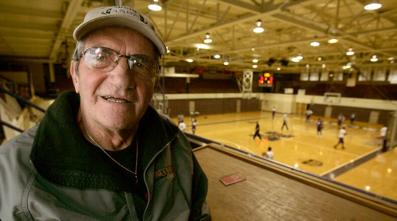 Jack Gordon, of WPFB radio in Middletown, the longtime radio voice of Middletown High School football and basketball, at Wade E. Miller Gym in Middletown, Ohio on Dec. 1, 2009. Gordon died Saturday at the age of 85. Staff file photo