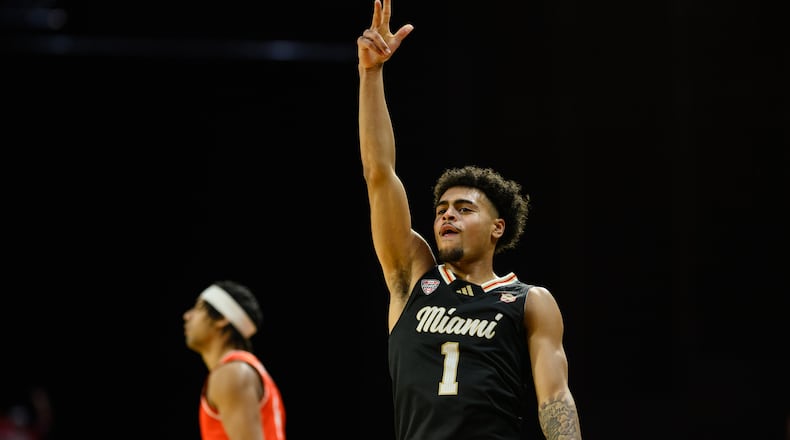 Miami's Trey Perry celebrates after hitting a 3-pointer during the second half of their game against Bowling Green on Friday, Feb. 20, 2026 at Millet Hall. JEREMY MILLER / CONTRIBUTED PHOTO