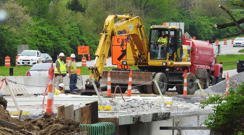 Construction continues on the overpass at the interchange of Ohio 63 and Ohio 4 Wednesday, April 28, 2021 in Monroe. NICK GRAHAM / STAFF