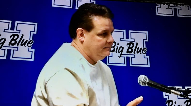 Despite Hamilton Schools officials deciding this week to switch away from its previous mandatory masking policy, school board members Thursday evening continued to hear stinging criticisms. Speakers primarily focused on the board's recent interactions with the public during meetings where masks were addressed. School resident Dan Acton (pictured) was among those complaining the city schools should never have gone to mandatory masking for students. (Photo By Michael D. Clark\Journal-News)