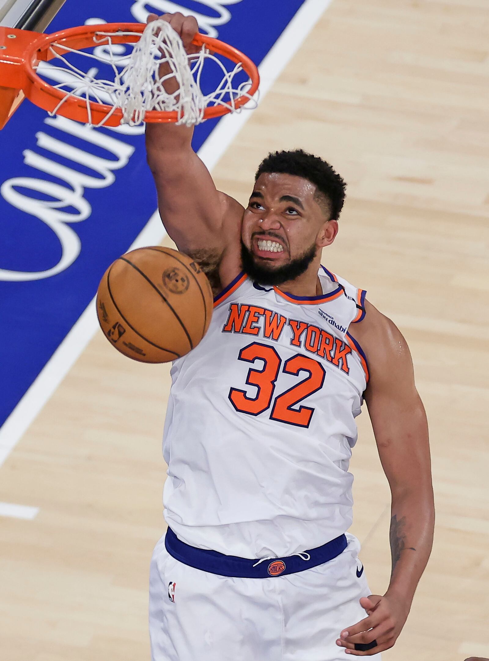 New York Knicks center Karl-Anthony Towns (32) scores against the Indiana Pacers during the fourth quarter of Game 5 of the NBA basketball Eastern Conference final, Thursday, May 29, 2025, in New York. (AP Photo/Adam Hunger)