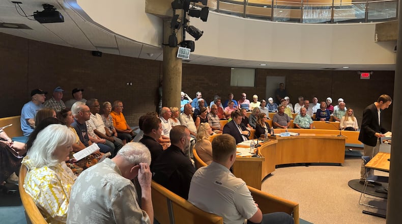 A packed council chambers on Aug. 5, 2025 saw 19 community members speak against a 217 single-home development in Middletown's Miller Ridge area. BRYN DIPPOLD/STAFF