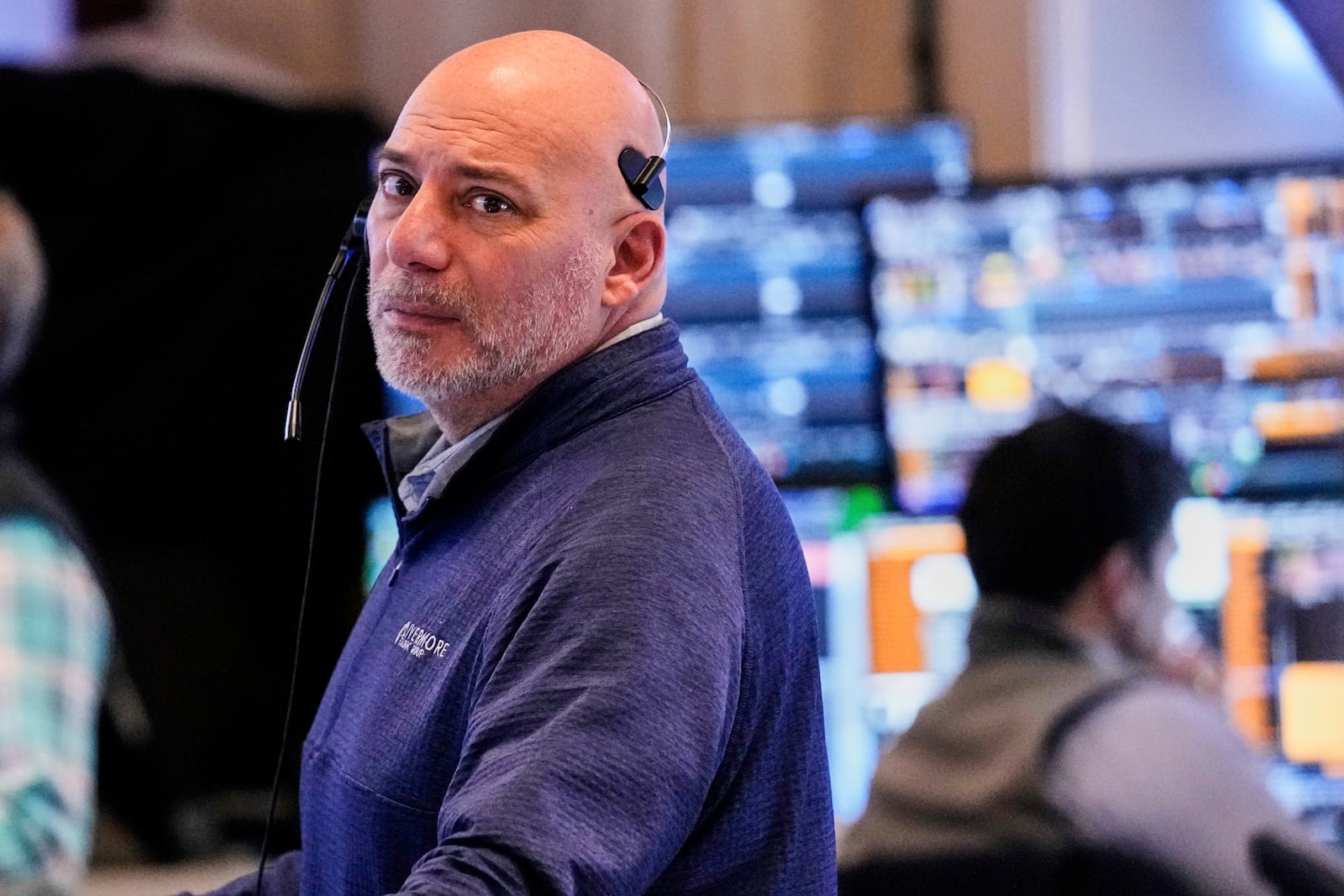 Trader Vincent Napolitano works on the floor of the New York Stock Exchange, Wednesday, April 16, 2025. (AP Photo/Richard Drew)