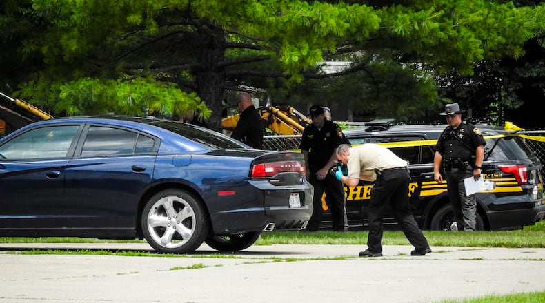 Butler County Sheriff’s deputies investigate a homicide near Trenton in this file photo from July 2023. Deputies will receive a 5% increase in their salaries in 2025. NICK GRAHAM/STAFF