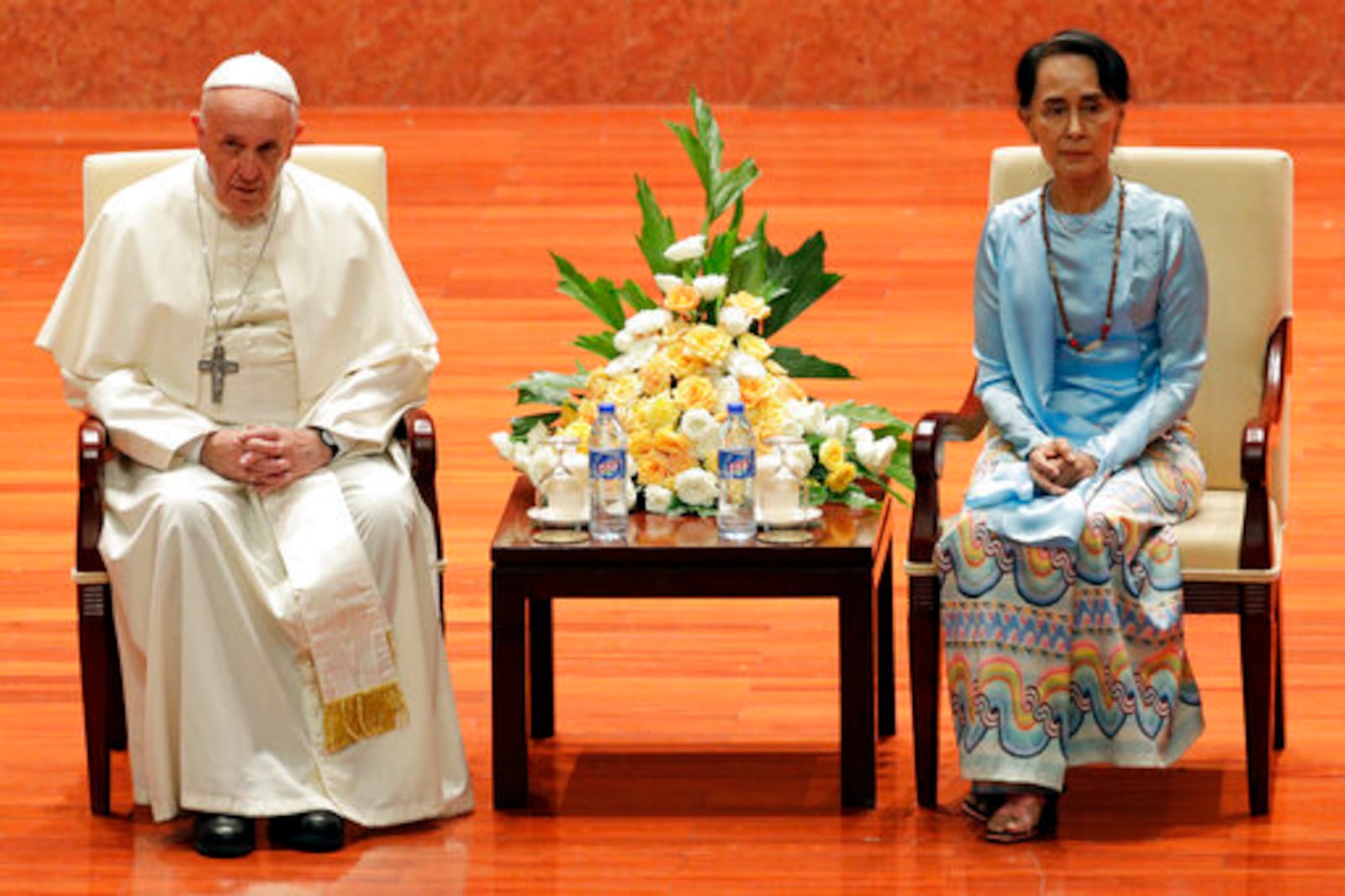 File - Pope Francis and Myanmar's leader Aung San Suu Kyi meet at the International Convention Centre of Naypyitaw, Myanmar, Tuesday, Nov. 28, 2017. (AP Photo/Andrew Medichini, file)