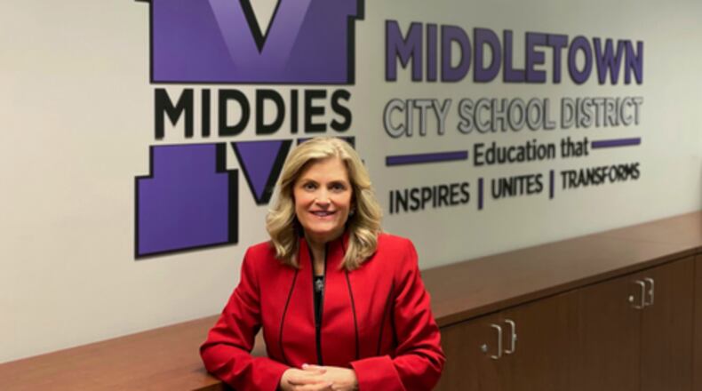 The leaders of one of Butler County’s largest school systems decided to stay with a veteran district administrator in picking its next superintendent. 	Deborah Houser was chosen Monday evening by the Middletown Board of Education as the new leader of city school district. She is the first female superintendent in the school system's 170-year history. (Provided Photo\Journal-News)
