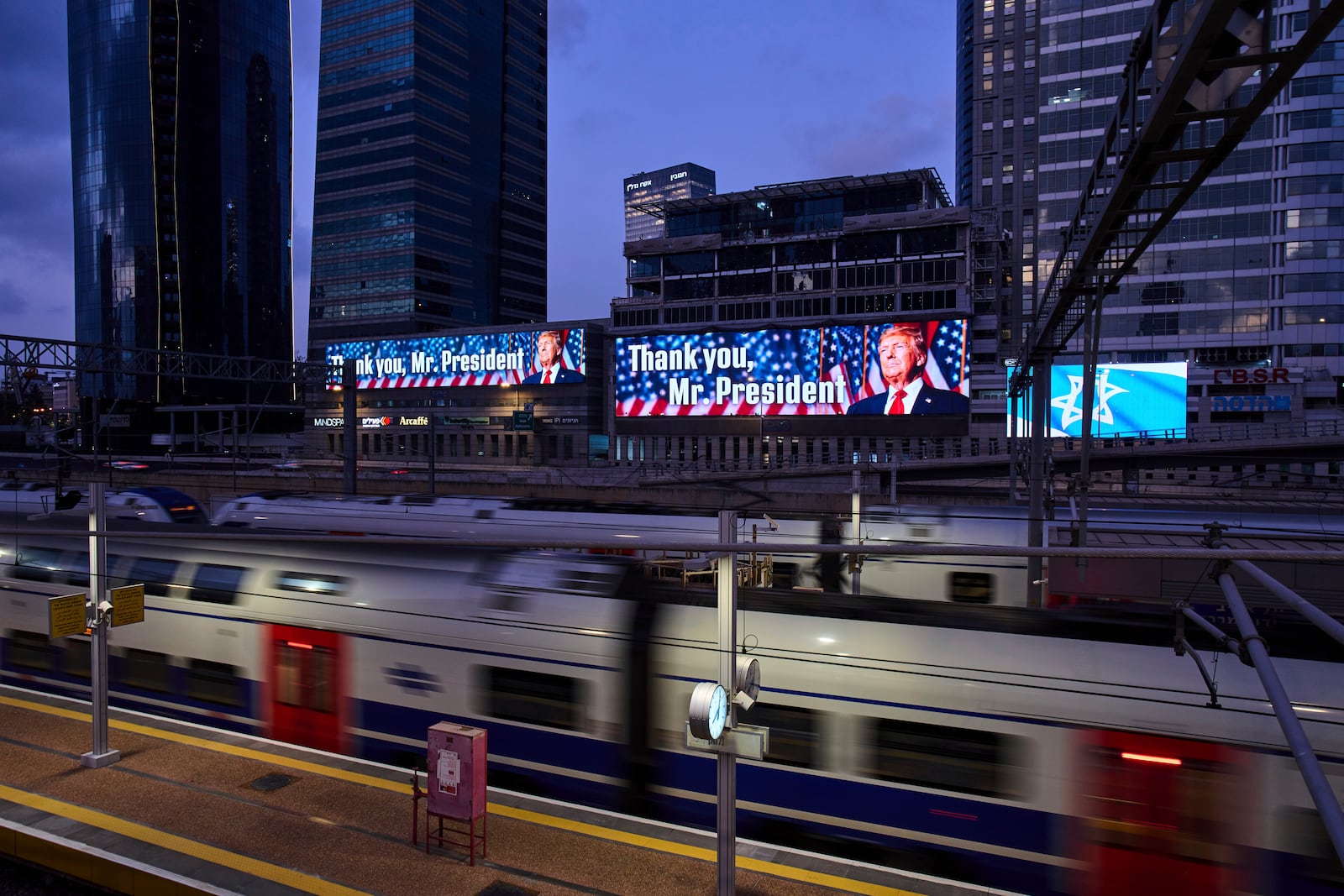 An electronic billboard beams an image of President Donald Trump alongside the message "Thank you, Mr. President" referring to the U.S. involvement in the war between Israel and Iran, in Ramat Gan, Israel, Sunday, June 22, 2025. (AP Photo/Bernat Armangue)