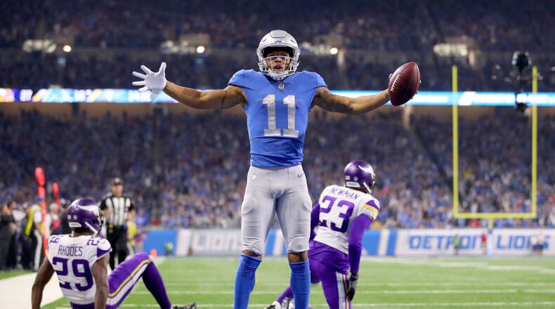 DETROIT, MI - NOVEMBER 23: Marvin Jones #11 of the Detroit Lions celebrates his fourth quarter touchdown against the Minnesota Vikings at Ford Field on November 23, 2017 in Detroit, Michigan. (Photo by Gregory Shamus/Getty Images)