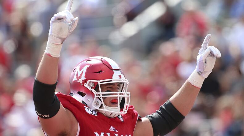 Miami Redhawks left tackle Tommy Doyle during an NCAA football game on Saturday, Sept. 7 , 2019 in Oxford , OH . (AP Photo/Tony Tribble)