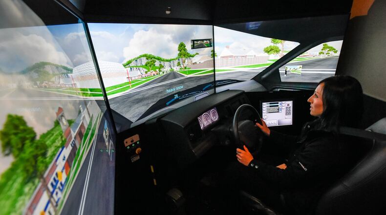 Middletown Division of Police Detective Beth Stewart sits in the seat of a driving simulator during a training session given by The Attorney General’s Ohio Peace Officer Training Academy Wednesday, Feb. 1 at the police department in Middletown. The department received a $10,000 grant from the Middletown Community Foundation for training. NICK GRAHAM/STAFF