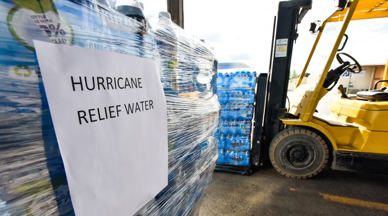 The city of Franklin is partnering with Caring Partners, a local mission resource center, to collect personal hygiene and cleaning supplies as well as bottled water for areas affected by recent hurricanes. NICK GRAHAM/STAFF