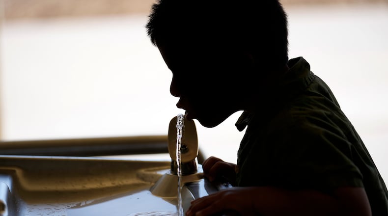 FILE - A student drinks from a water fountain at an elementary school in California, Sept. 20, 2023. (AP Photo/Marcio Jose Sanchez, File)