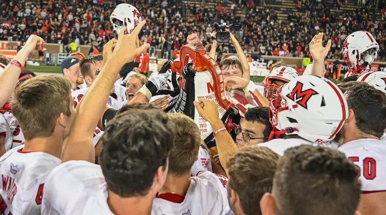 Miami celebrates its win over Cincinnati last year. Miami Athletics photo