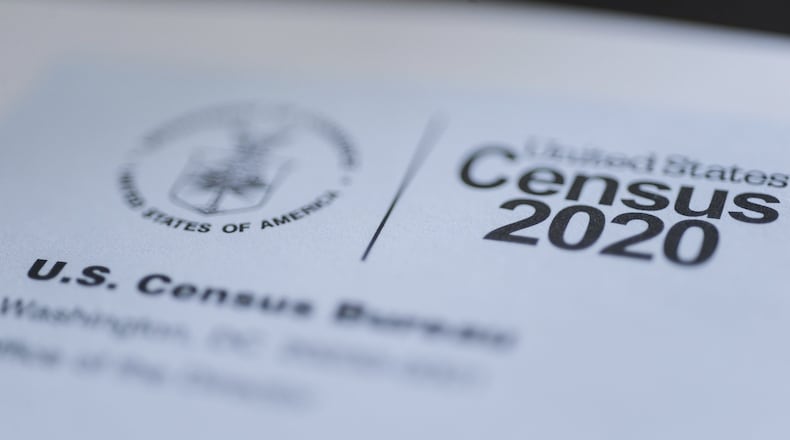 This March 18, 2020 file photo taken in Idaho shows a form for the U.S. Census 2020. Filling out this year’s census form won’t get you a check from the federal government as claims circulating on social media suggest. The posts state that if you respond to the census, you will receive a $1,200 stimulus check from the federal government that’s intended to help Americans during the COVID-19 pandemic. Congress is considering mailing checks directly to households, but hasn’t approved funding for the stimulus funding package yet. (John Roark/The Idaho Post-Register via AP, File)