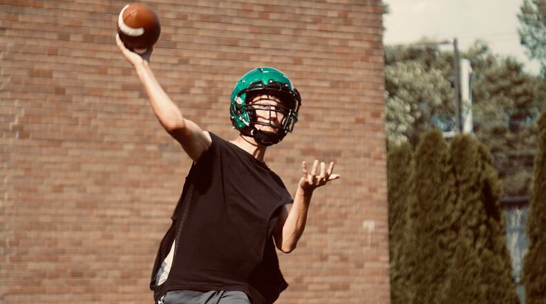 New Miami quarterback Sam Mayer throws a pass during practice last week at New Miami High School. Chris Vogt/CONTRIBUTED