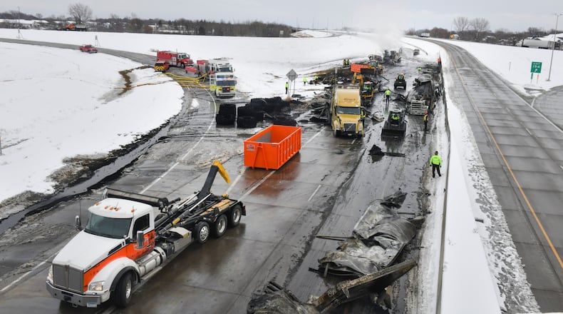 In this Nov. 12, 2020 file photo, the westbound lanes of Interstate Highway 94 are closed as crews remove vehicles and debris from the scene of a multi-vehicle accident near Monticello, Minn. The smaller, lighter vehicles that women more often drive, and the types of crashes they get into, may explain why they are much more likely to suffer a serious injury in a collision than men, a new study published Thursday, Feb. 11, 2021 found. (Dave Schwarz/St. Cloud Times via AP, File)
