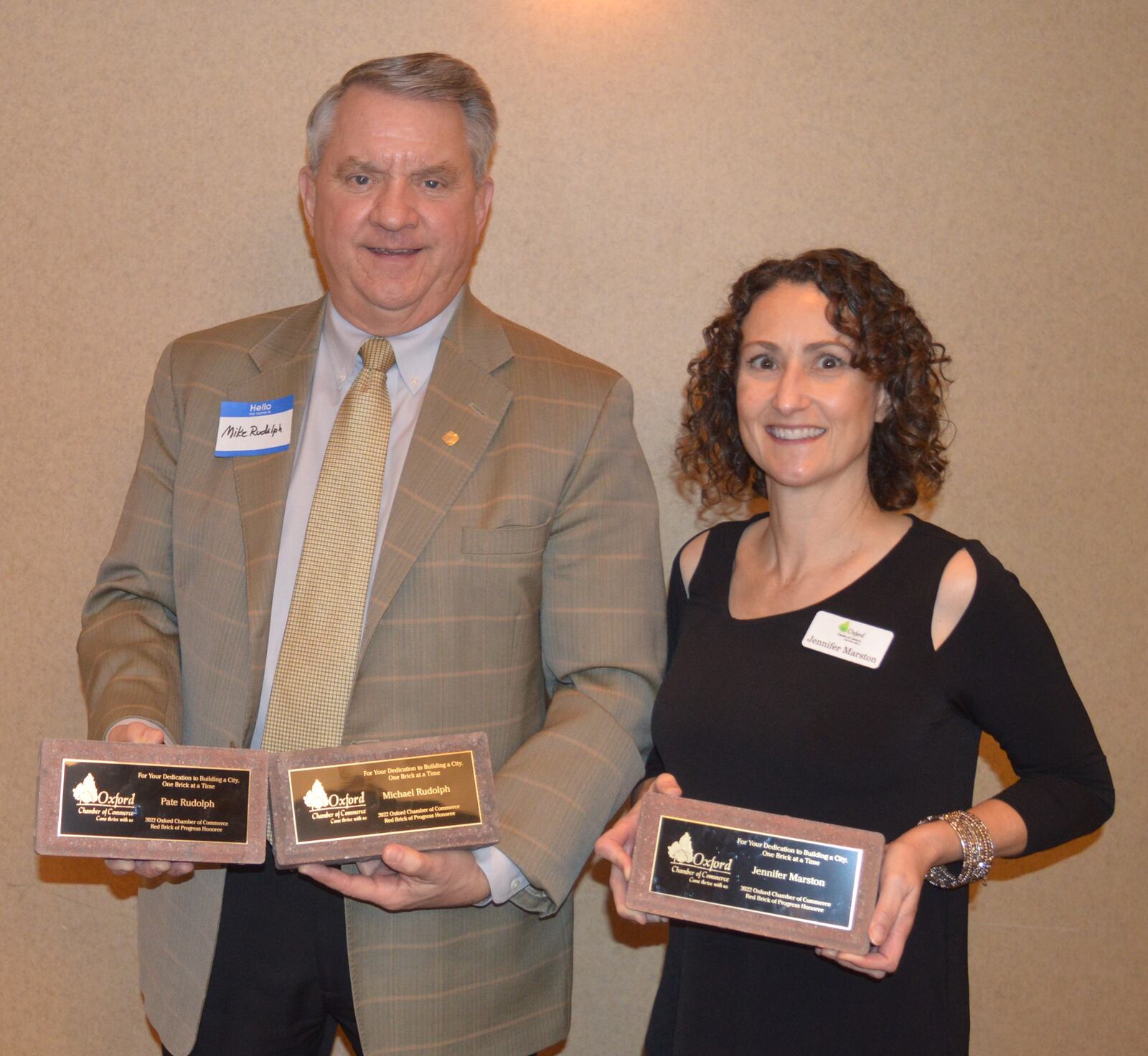 Three Chamber Champions were thanked for their service to the Chamber of Commerce and the Oxford community. Mike Rudolph, left, accepted his own award as well as one for his wife, Pate, who was unable to attend, and also honored was Jennifer Marston. CONTRIBUTED/BOB RATTERMAN