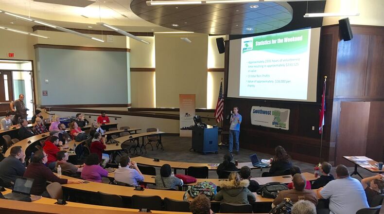 Organizers of the annual Southwest Ohio Give Camp present their finished projects volunteer tech professionals completed to help area non-profits. The weekend-long seminar was held at Miami University’s Voice of America campus.