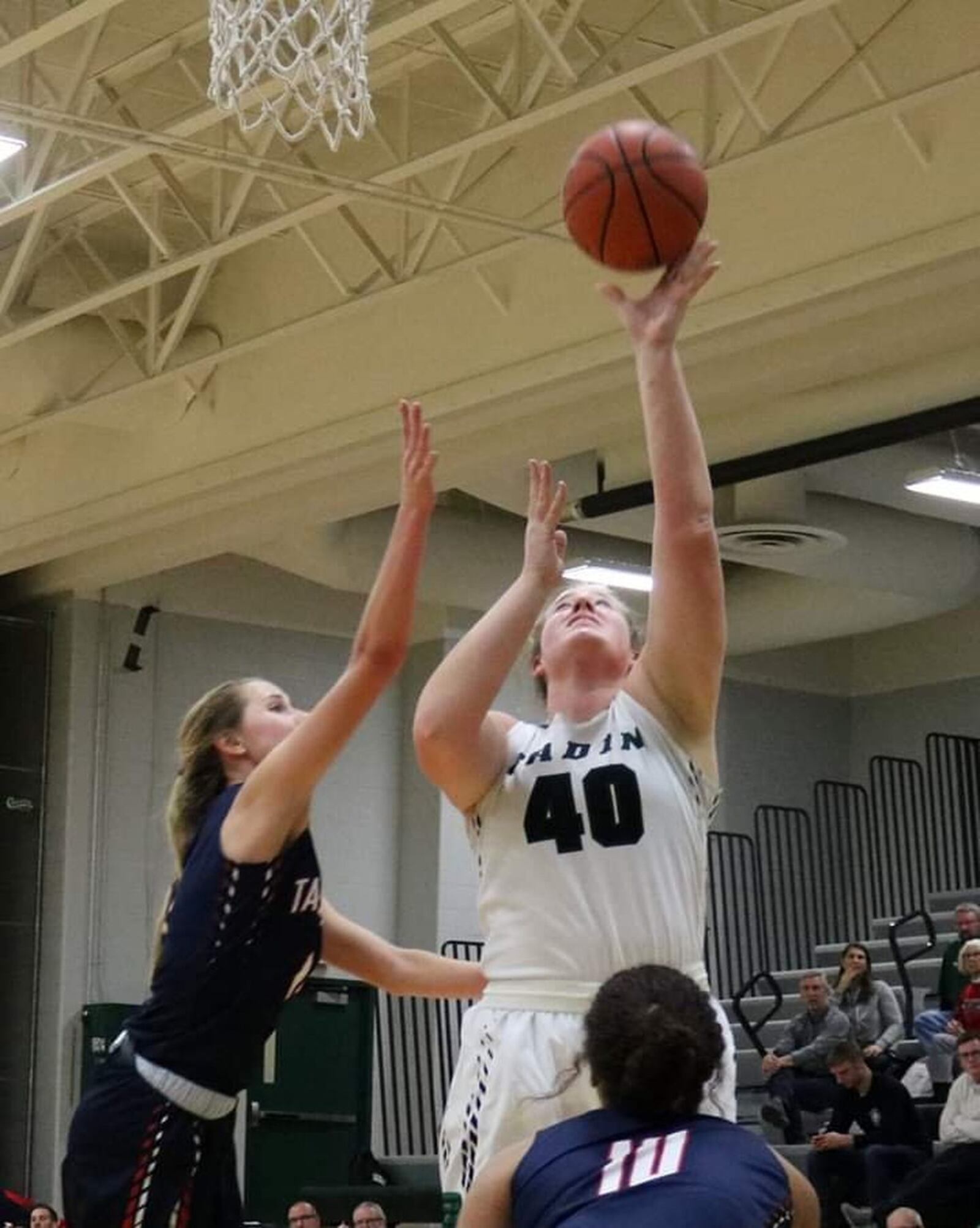 Badin’s Emma Broermann (40) goes up for two of her 24 points Wednesday night at Mulcahey Gym in Hamilton. That’s Talawanda’s Kyra Koontz (10) and Sophie Pohlabel on the play. Badin won 79-36. CONTRIBUTED PHOTO BY TERRI ADAMS