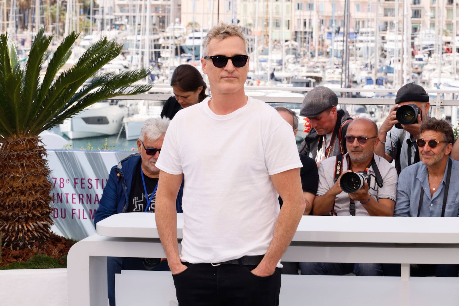 Joaquin Phoenix poses for photographers at the photo call for the film 'Eddington' at the 78th international film festival, Cannes, southern France, Saturday, May 17, 2025. (Photo by Joel C Ryan/Invision/AP)
