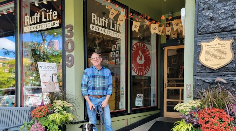 Gary and his best bud, Jack, standing outside of Ruff Life Pet Outfitters in Petoskey, Michigan. CONTRIBUTED