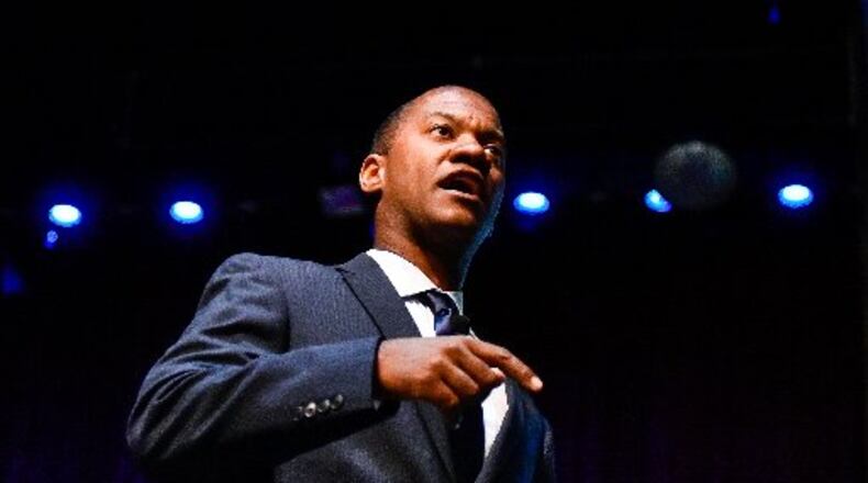Marlon Styles Jr., the new superintendent of Middletown City School District, speaks to staff members during a rally to kick off the school year Friday at Dave Finkelman Auditorium at Miami University Middletown. NICK GRAHAM/STAFF