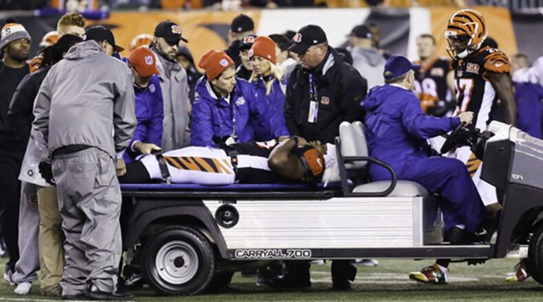 Cincinnati Bengals linebacker Vontaze Burfict leaves Monday’s game against the Pittsburgh Steelers on a stretch. GREG LYNCH/STAFF PHOTO