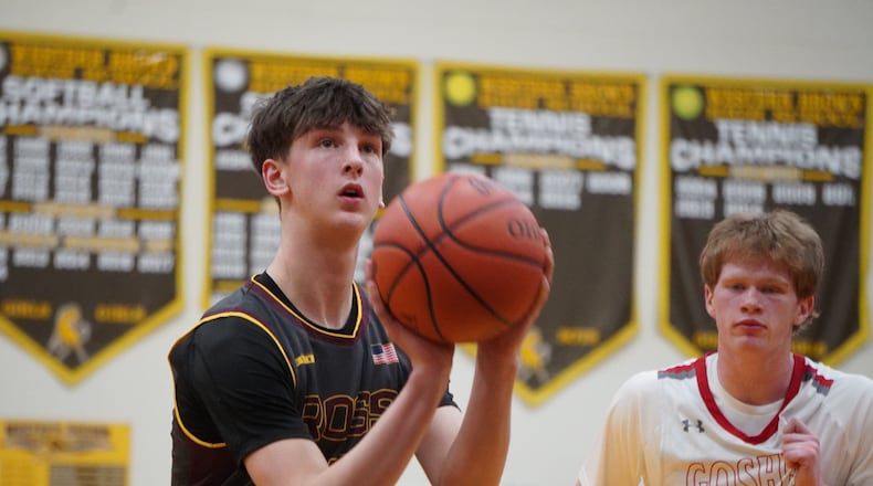 Ross senior Bryce Fulmer eyes a free throw attempt during his Division III district semifinal game against Goshen on Monday night at Western Brown. CHRIS VOGT / CONTRIBUTED