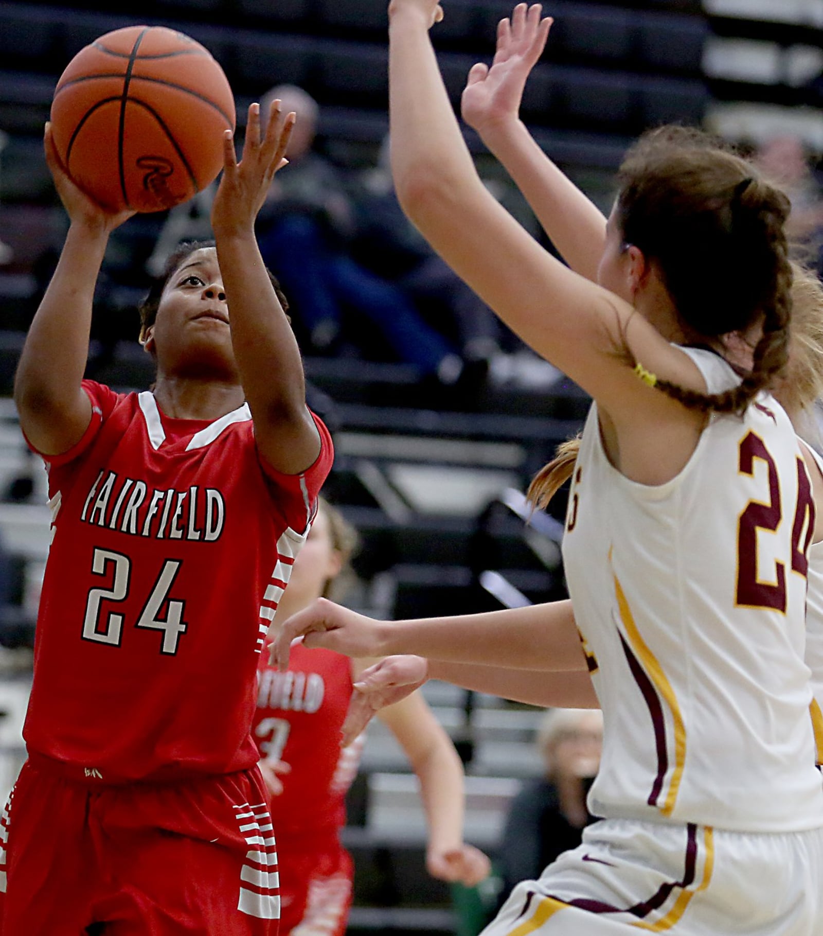 Fairfield guard Brooke Spaulding shoots against Turpin forward Elise Schulok during their Division I sectional semifinal Thursday night at Lakota East. CONTRIBUTED PHOTO BY E.L. HUBBARD