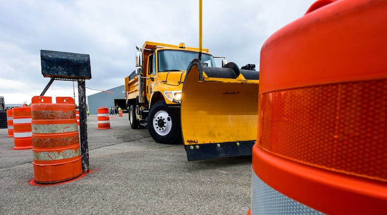 As colder weather approaches, local communities say they are ready for snow and ice control this winter. In addition to stockpiling salt barns throughout Butler County, snowplow drivers recently participated in the 2016 Butler County Snowplow Roadeo was held Thursday, Nov. 3 at the Butler County Engineer’s Office to test and hone driving skills for road crews in preparation of winter weather in the coming months. County crews and drivers from townships throughout the area participated. NICK GRAHAM/STAFF