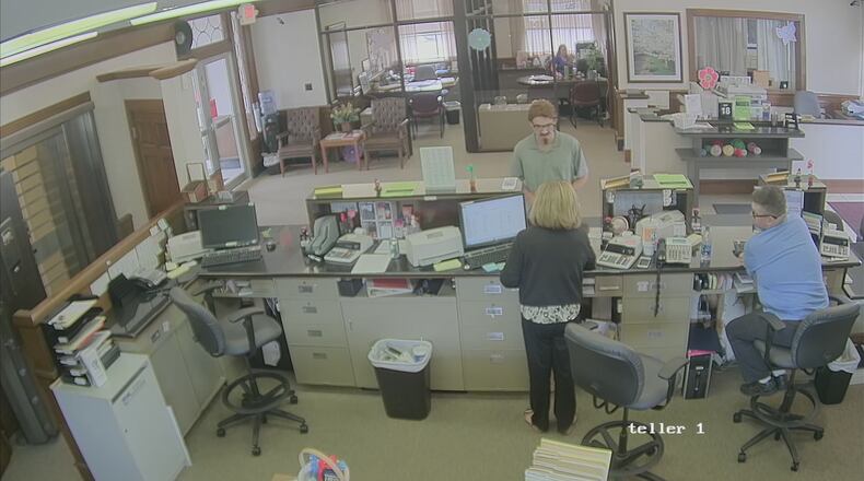 Surveillance photo of a person who police say robbed Union Savings Bank in Franklin today. PROVIDED