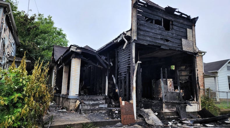 This house in the 1700 block of Manchester Avenue was severely damaged by a fire Sunday night. The only resident and Middletown firefighters were not injured, officials said. NICK GRAHAM/STAFF
