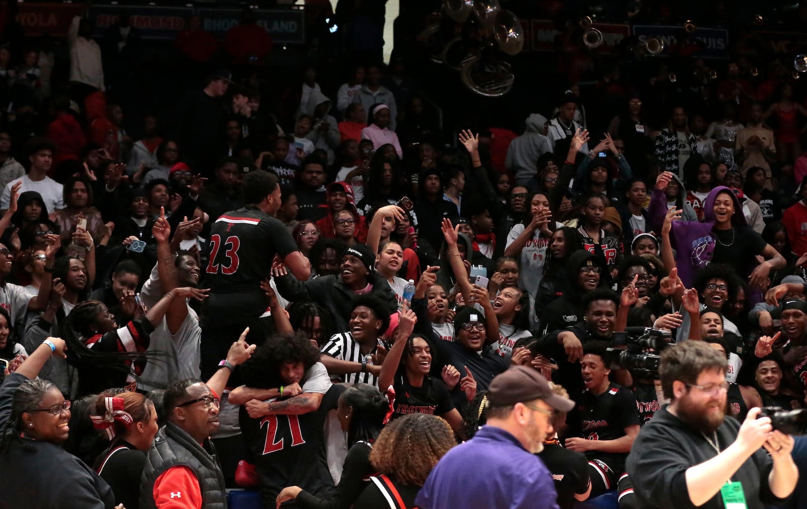 Trotwood players celebrate with its student section following a Division III state semifinal game on Thursday, March 19, 2026, at UD Arena. Trotwood 55-53. STEVEN WRIGHT / STAFF
