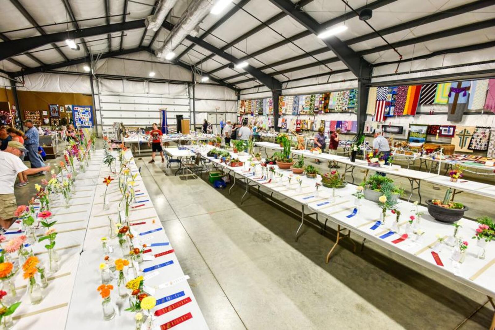 Crafts, photography, flowers and other exhibits fill the Art Hall Wednesday, July 25 at the Butler County Fair in Hamilton. 