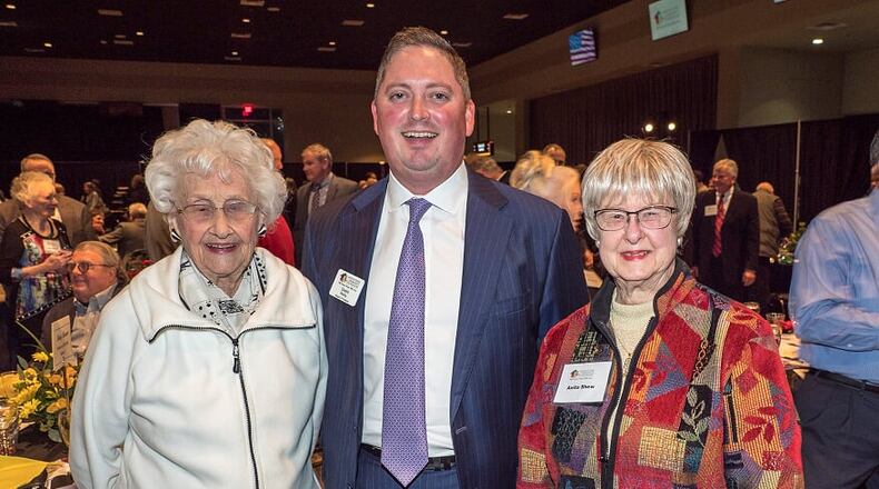 Longtime community volunteer Mary Maurer, left, stands with