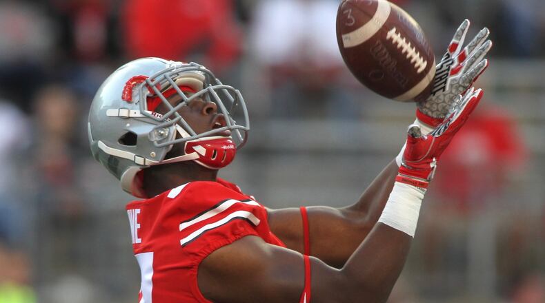 Ohio State’s Derrick Malone, a Thurgood Marshall graduate, warms up before a game against Oklahoma on Saturday, Sept. 9, 2017, at Ohio Stadium in Columbus. David Jablonski/Staff
