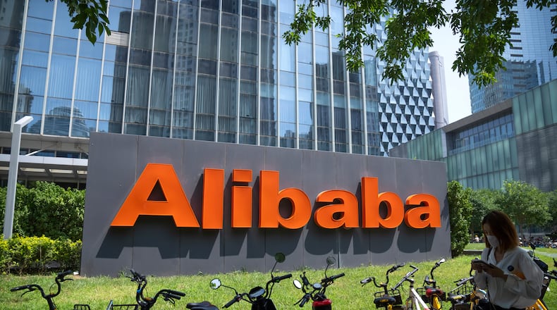 FILE - The logo of Chinese technology firm Alibaba is seen at its office in Beijing, Aug. 10, 2021. (AP Photo/Mark Schiefelbein, File)