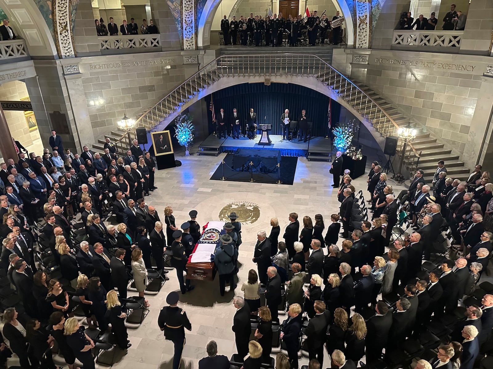 The casket of former Missouri Gov. and U.S. Sen. Christopher "Kit" Bond is brought into the Rotunda of the Missouri Capitol for a memorial service on Tuesday, May 20, 2025, in Jefferson City, Missouri. (AP Photo/David A. Lieb)