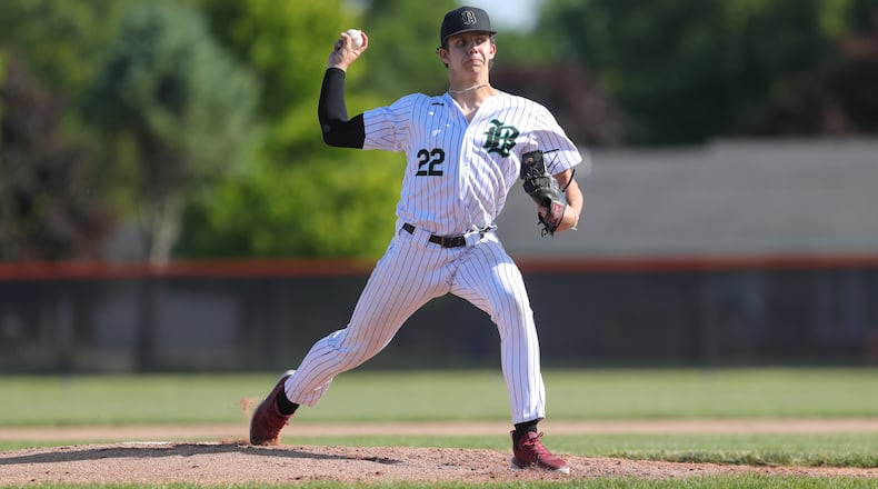 Badin's Nik Copenhaver fires a pitch plateward during the Rams' 10-0 win over Kenton Ridge in a Division II district final baseball game on May 25, 2023. Copenhaver struck out seven in a complete-game shutout. Michael Cooper/CONTRIBUTED