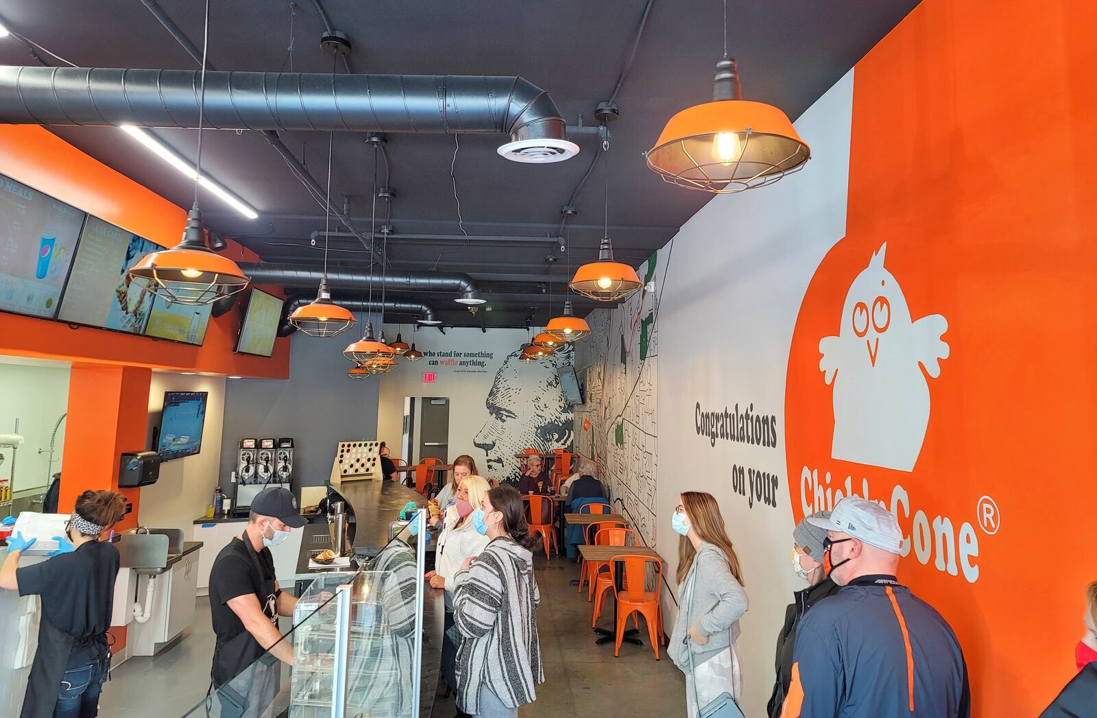 Chick'nCone restaurant has opened at The Marcum in Hamilton. The restaurant features air fried chicken chunks with multiple sauces served in fresh made waffle cones. NICK GRAHAM / STAFF
