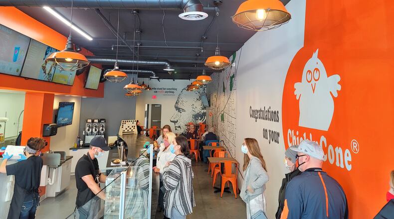 Chick'nCone restaurant has opened at The Marcum in Hamilton. The restaurant features air fried chicken chunks with multiple sauces served in fresh made waffle cones. NICK GRAHAM / STAFF