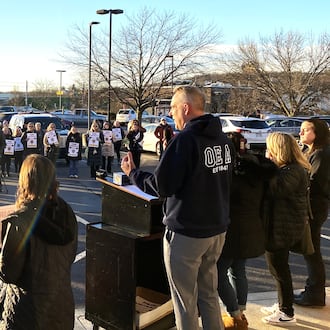 More than a 150 Ross Schools teachers and supporters rallied at the opening of a “strike” headquarters Monday as their union continued to push a possible work stoppage should contract talks not turn in their favor. (Photo By Michael D. Clark/Journal-News)