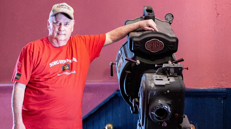 Bob Melloh pictured with one of the Sorg theater’s original 35-millimeter projectors. CONTRIBUTED