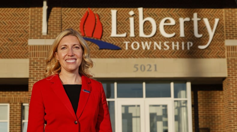 Jesse Lightle was voted in as new Liberty Township administrator this week. Lightle, who was administrator for the Dayton-area’s Washington Twp., will earn $173,500 annually and she began working soon after the township's trustees unanimously voted to hire her.  NICK GRAHAM/STAFF